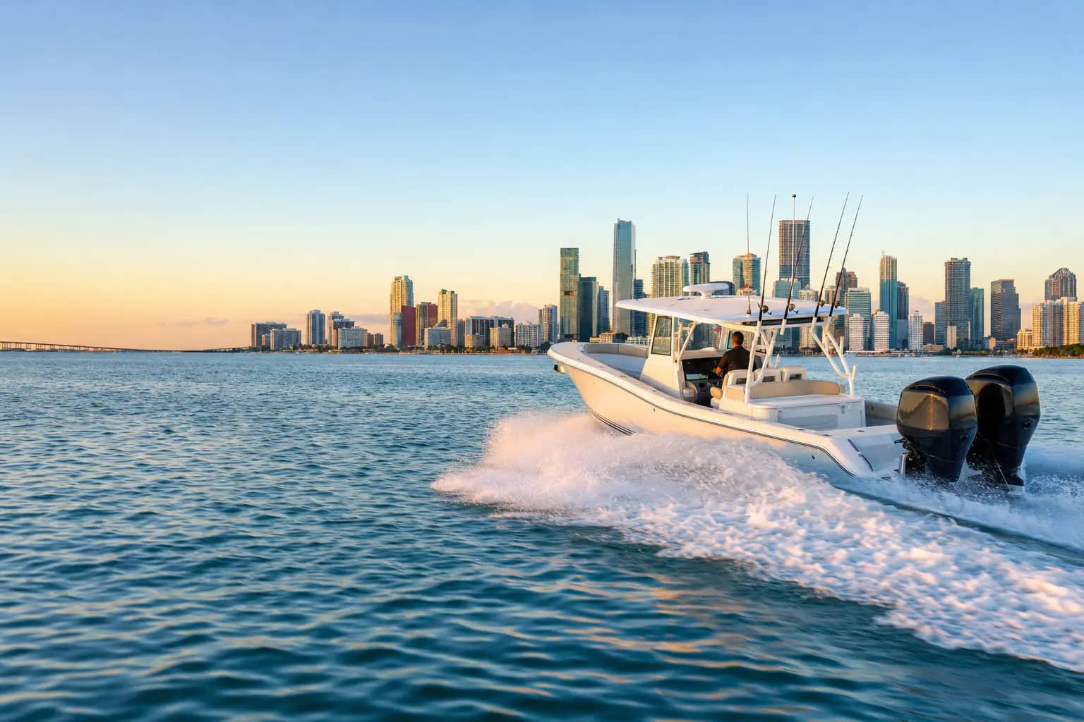 Center console boat cruising on Biscayne Bay with the Miami skyline